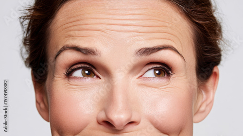 Close-Up of Woman with Forehead Wrinkles, Botox Treatment for Smoothing Wrinkles, Beauty and Anti-Aging Stock Image for Aesthetic and Skincare Themes

