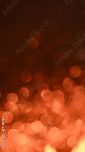 Festive background with sparkling golden bokeh.	
