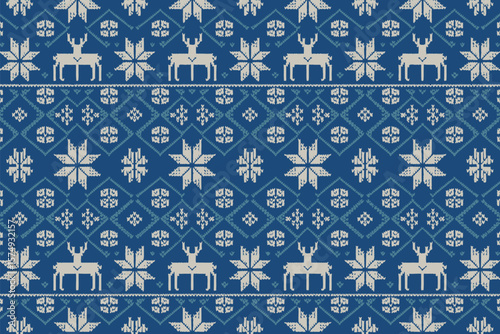 A blue and white knitted pattern featuring reindeer and snowflakes in a repeating design element style