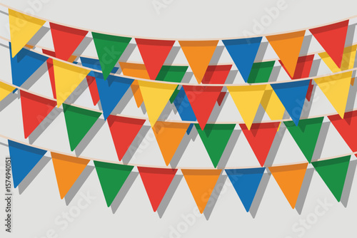 A festive display of colorful triangular pennant banners hanging against a plain light gray background