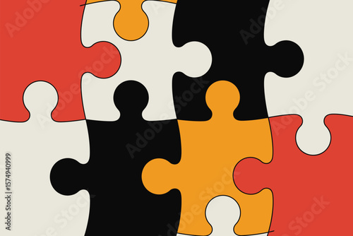A close up of a jigsaw puzzle with red orange black and cream pieces fitting together tightly in a pattern