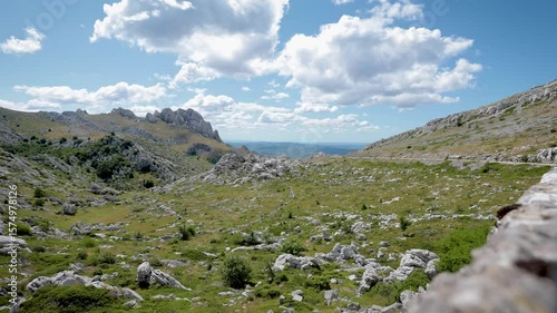 4k timelapse of Tulove Grede from Mali Alan Pass Stunning View of Croatia s Velebit Mountains with Rugged Limestone Peaks, Rocky Slopes, and a Dramatic Sky over the Remote and Untouched Dinaric Alps