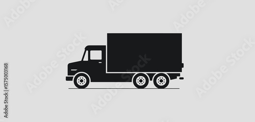 Simple black silhouette of a box truck with three axles on a light gray background