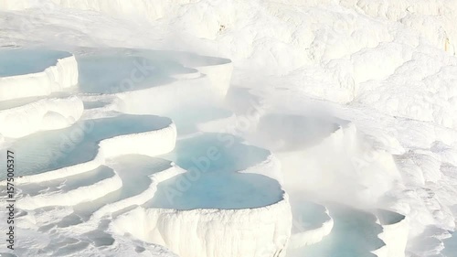 Pamukkales travertines and thermal waters create a surreal landscape