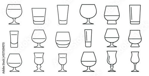 Set of glasses with different shapes and sizes. The glasses are arranged in a row, with some being taller and thinner, while others are shorter and wider