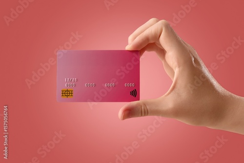 Hand with credit card on re...