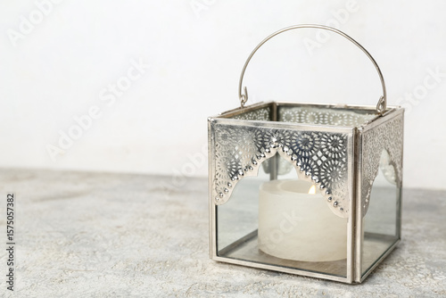 Silver metal lantern with g...