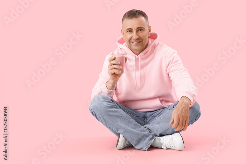 Mature man with glass of fr...