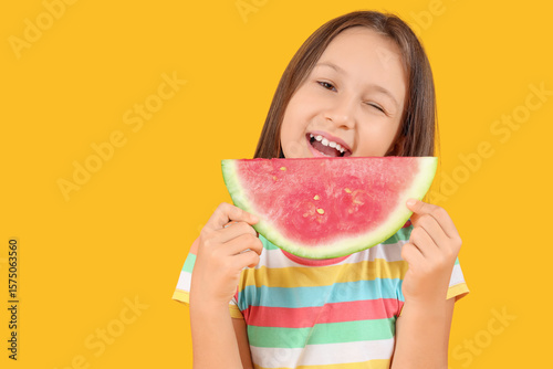 Happy little girl with slic...