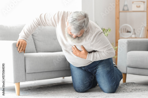Elderly man having heart at...