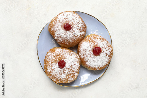 Plate with sweet donuts for...