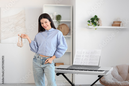 Young woman near synthesize...