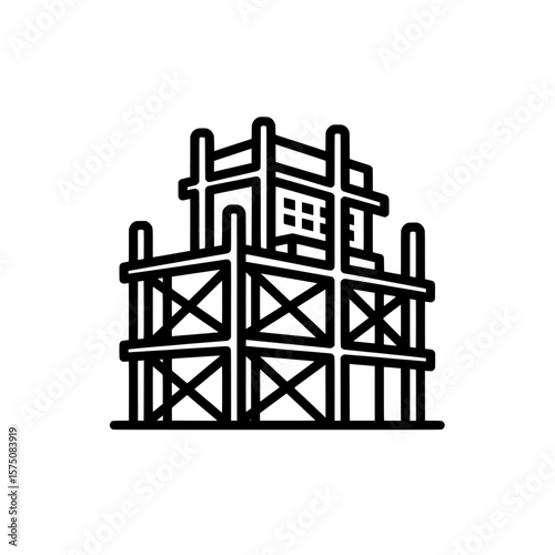 Building structure under construction with scaffolding and window frame
