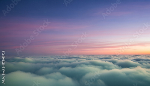 Cloudscape of soft mist under gradient dusk sky in magical serene mood