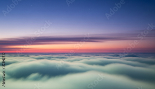 Serene cloudscape under dawn-dusk sky with soft mist, pastel gradients, and peaceful natural blur