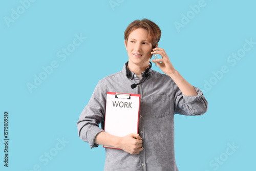 Teenage boy with headset an...