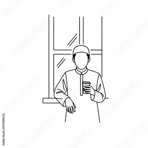 Person holding a drink by the window in a minimalistic setting