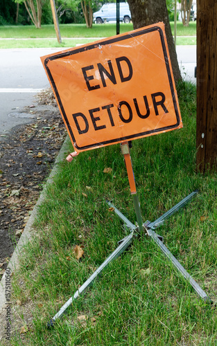 END DETOUR sign on residential easement