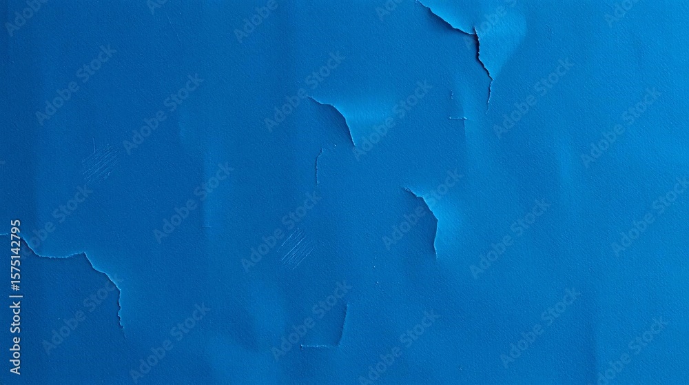 Obraz premium Texture of blue paper with torn edges. 