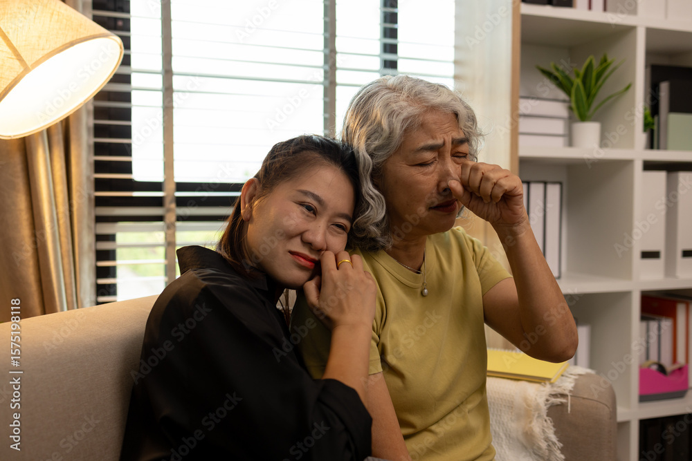 Obraz premium a mother and daughter are spending their free time together at home, the daughter spends his weekend visiting his elderly mother, a family full of love between a mother and daughter
