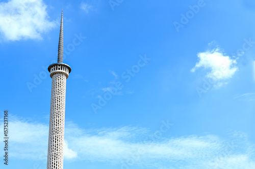 istiqlal mosque's single minaret, which is 96 meters high and symbolizes the number of surahs in the Qur'an.