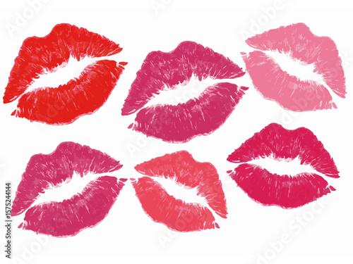 Set of colorful lipstick kiss prints in red, pink, and magenta shades on white background
