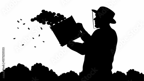 Silhouette of beekeeper with protective gear holding a hive box with bees flying around in black and white