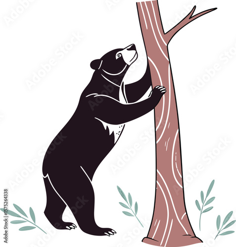 A curious black bear cub stands on its hind legs reaching up a tree trunk silhouette