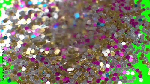 Sparkling Confetti Falling on Green Screen Background in Slow Motion