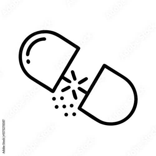 Pill capsule split open with contents spilling out  