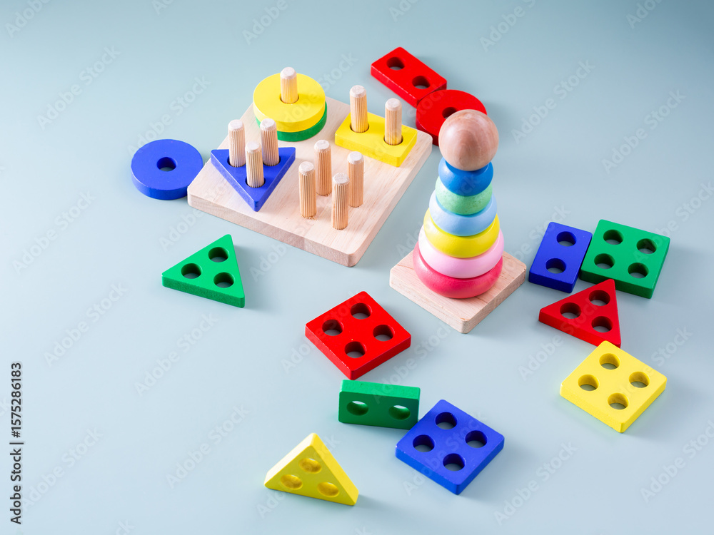 Obraz premium Colorful Wooden Toys for Kids with Shapes and Stacking Fun