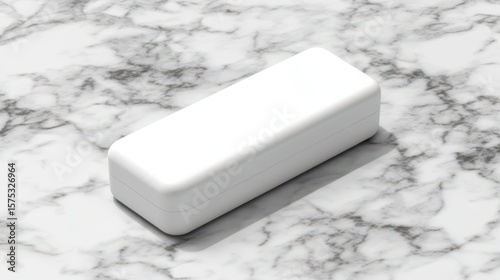 Blank white rectangular box on a marble surface.