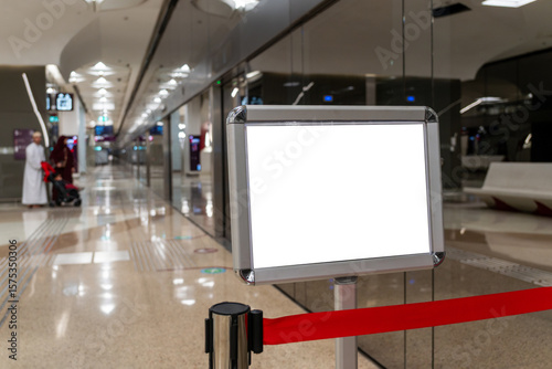 Tablou pe pânză White billboard mock-up stands in a subway or train station, poised to convey compelling advertisements to the commuting audience