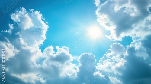 Bright sun breaking through fluffy clouds