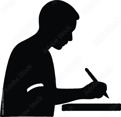 Silhouette of a Person Writing or Drawing at a Desk