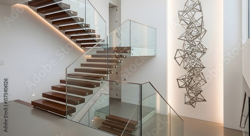 Modern staircase design with glass railing and wood steps in luxury home interior architecture