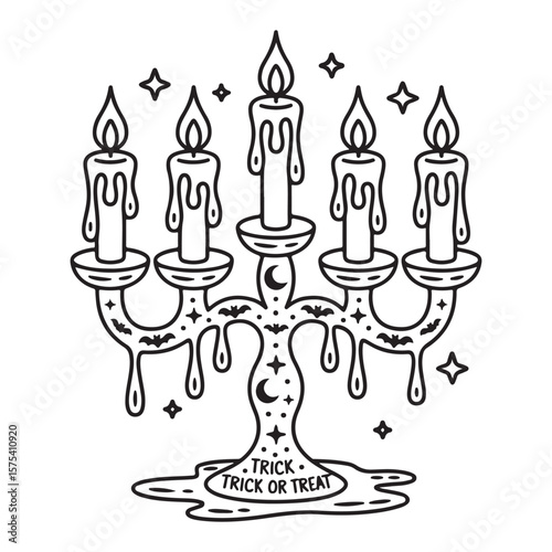 Halloween candelabra with dripping wax and spooky elements