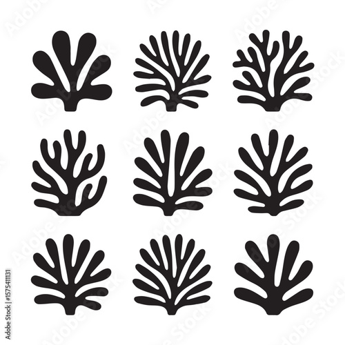 Collection of nine black abstract organic shapes resembling coral or plants on a white background