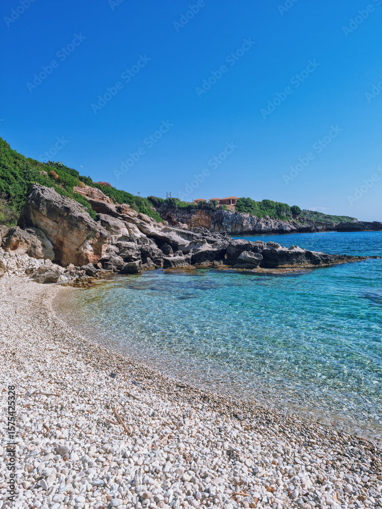 Fototapeta premium Turqouise waters at Porto Skala Beac - the best beach for snorkeling in Southern Kefalonia near Poros and Skala, Kefalonia island, Greece