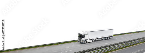 A large white semi truck is driving down a highway.PNG on transparent background