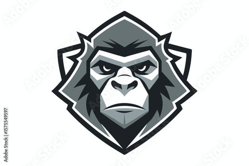 Intimidating gorilla gazes forward, stylized in gray tones, within sharp shield shape