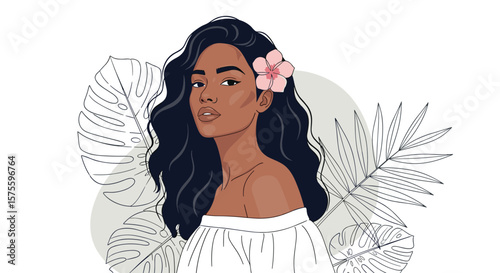 Beautiful tropical woman with flower in her hair enjoying a sunny day