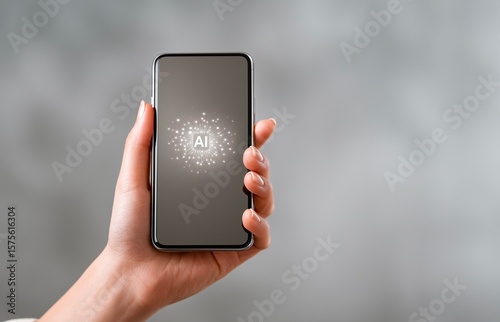 Female hand holding a smartphone with an artificial intelligence symbol on the screen