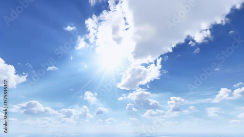 Seamless loop animation background wallpaper of fluffy white clouds moving over a bright sun shining in a clear blue sky  on a sunny summer day
