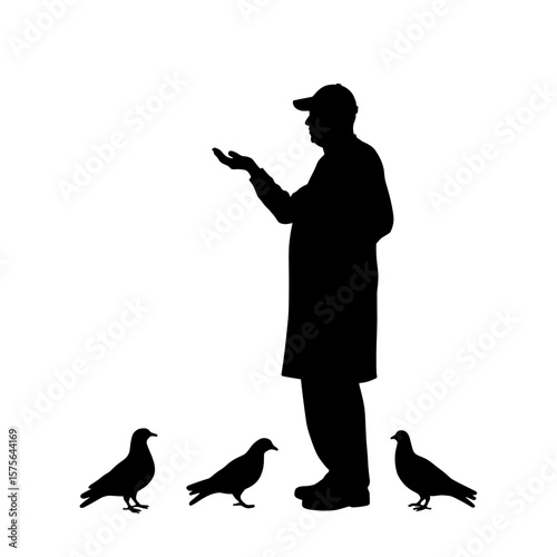 Silhouette of man feeding pigeons with outstretched hand against clean white background. This silhouette of man showing kindness and interaction with nature. 
