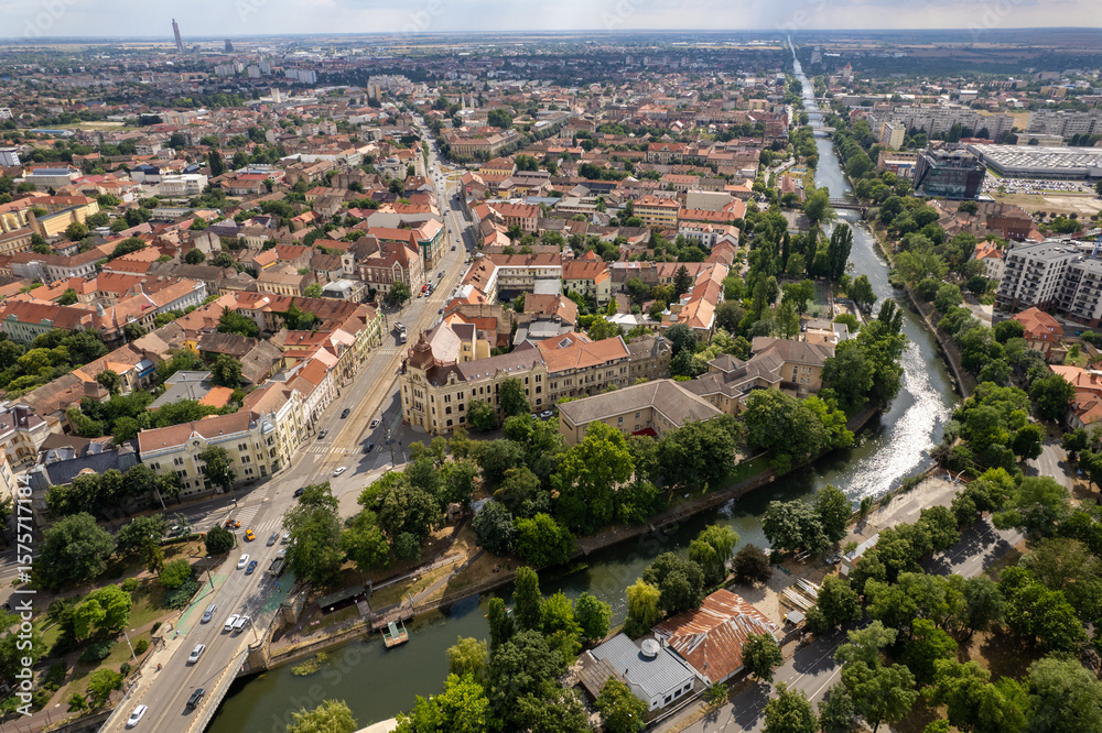 Fototapeta premium Timisoara, Romania - july 10 2025: Aerial drone image of Bega river in central Timisoara