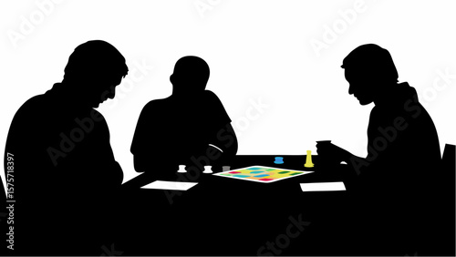 Silhouette of three people playing a board game on a table with cards and game pieces visible on top