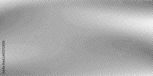 Grunge halftone gradient background. Faded grit noise texture. White and black sand wallpaper.