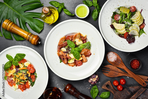 view from above of salads and food on plates. Healthy meal. Top view.