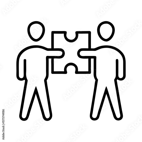 Two people holding puzzle pieces together illustrating teamwork concept  